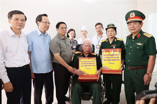 Le Premier ministre Pham Minh Chinh rend visite à des invalides de guerre à Ninh Binh ảnh 1 Le Premier ministre Pham Minh Chinh rend visite à des invalides de guerre à Ninh Binh ảnh 1