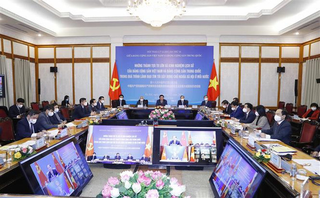 Les Partis communistes du Vietnam et de la Chine tiennent leur 16e colloque théorique ảnh 2