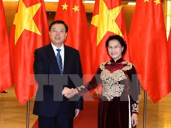 Le président du Comité permanent de l'APN chinoise​ termine sa visite au Vietnam ảnh 1