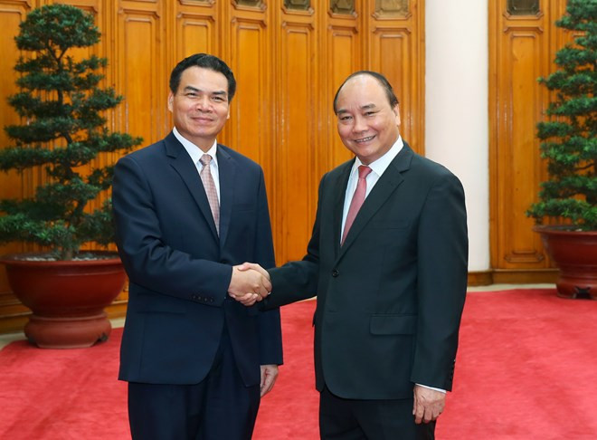 Nguyên Xuân Phuc reçoit le président du Bureau du gouvernement laotien ảnh 1 Nguyên Xuân Phuc reçoit le président du Bureau du gouvernement laotien ảnh 1