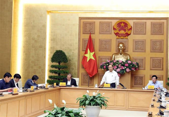 Le Premier ministre préside une réunion sur l’épidémie de COVID-19 ảnh 1 Le Premier ministre préside une réunion sur l’épidémie de COVID-19 ảnh 1