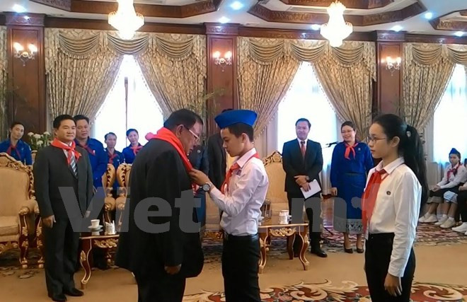 Les jeunes Vietnamiens et Laotiens cultivent les relations traditionnelles bilatérales ảnh 1 Les jeunes Vietnamiens et Laotiens cultivent les relations traditionnelles bilatérales ảnh 1