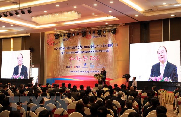 Nguyen Xuan Phuc à la conférence « Rencontre des investisseurs dans la province de Nghe An » ảnh 1 Nguyen Xuan Phuc à la conférence « Rencontre des investisseurs dans la province de Nghe An » ảnh 1