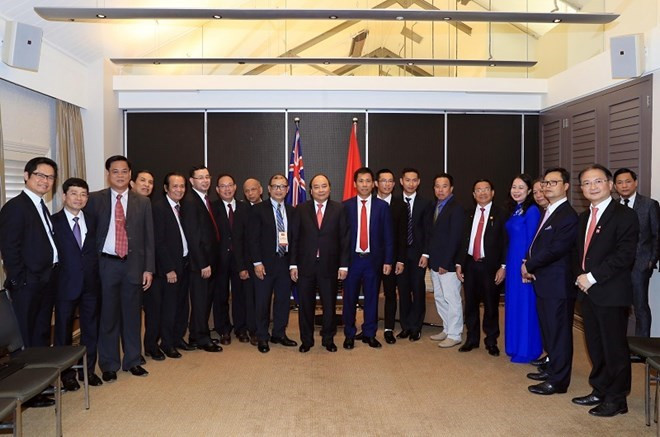 Le PM rencontre des entrepreneurs et intellectuels vietnamiens en Australie ảnh 1 Le PM rencontre des entrepreneurs et intellectuels vietnamiens en Australie ảnh 1
