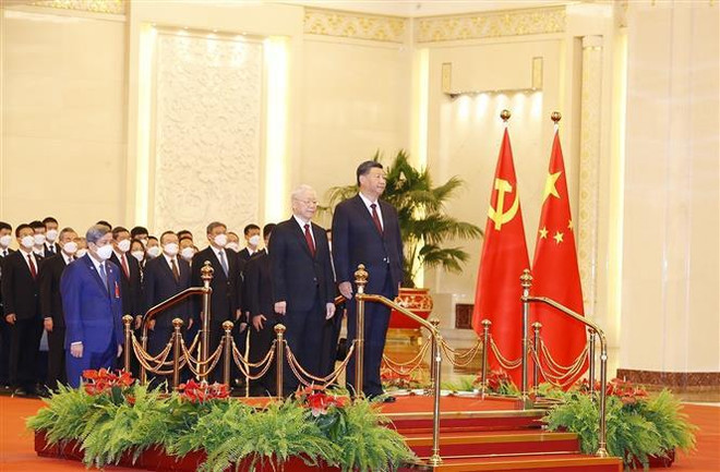 Cérémonie d’accueil officielle du leader du PCV Nguyên Phu Trong en visite officielle en Chine ảnh 1 Cérémonie d’accueil officielle du leader du PCV Nguyên Phu Trong en visite officielle en Chine ảnh 1