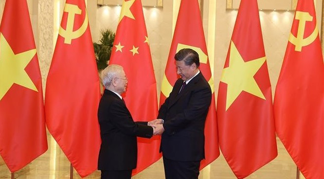 Cérémonie d’accueil officielle du leader du PCV Nguyên Phu Trong en visite officielle en Chine ảnh 2 Cérémonie d’accueil officielle du leader du PCV Nguyên Phu Trong en visite officielle en Chine ảnh 2