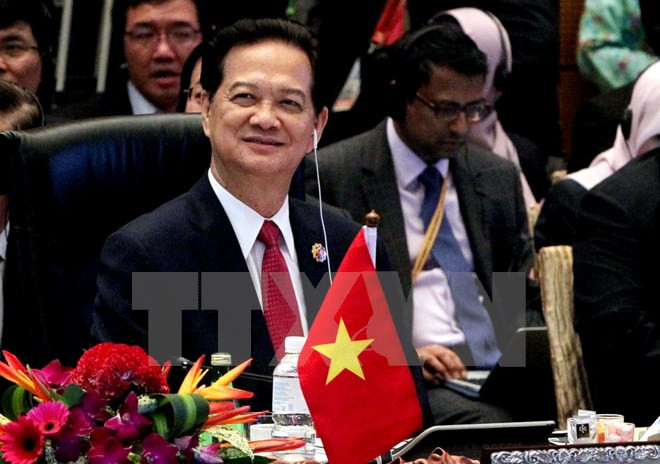 Le Premier ministre Nguyen Tan Dung part pour le COP 21 à Paris ảnh 1 Le Premier ministre Nguyen Tan Dung part pour le COP 21 à Paris ảnh 1