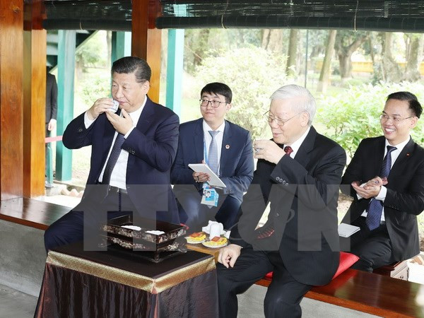 Le secrétaire général du PCV et le dirigeant chinois Xi Jinping assistent à un thé ảnh 1 Le secrétaire général du PCV et le dirigeant chinois Xi Jinping assistent à un thé ảnh 1