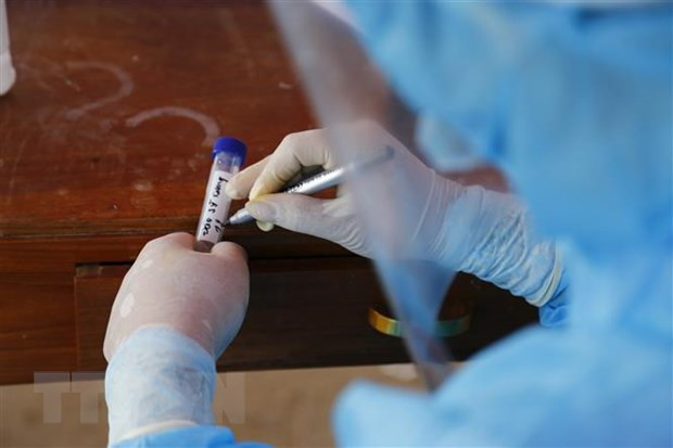 COVID-19 : le Vietnam enregistre plus de 65.600 cas en 24 heures ảnh 1