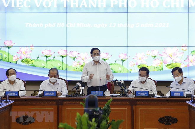 Le Premier ministre Pham Minh Chinh travaille avec Ho Chi Minh-Ville ảnh 1