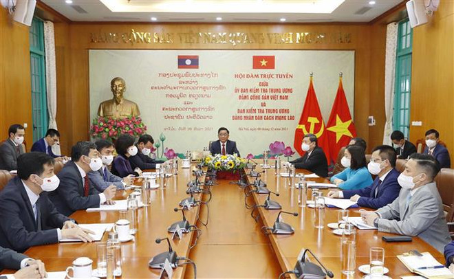 Vietnam-Laos: entretien en ligne entre les Commissions centrales de contrôle du PCV et du PPRL ảnh 1