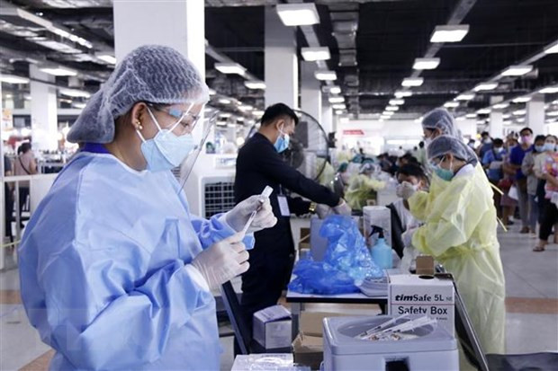 Le Laos commence le déploiement de la vaccination COVID-19 pour les 6-11 ans ảnh 1