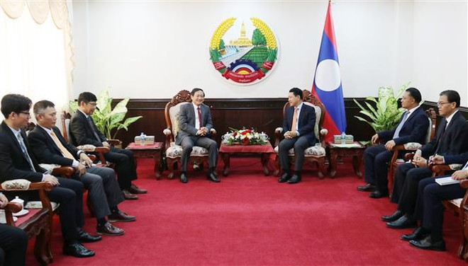 L'ambassadeur vietnamien formule ses vœux à l’occasion du Nouvel An du Laos ảnh 2