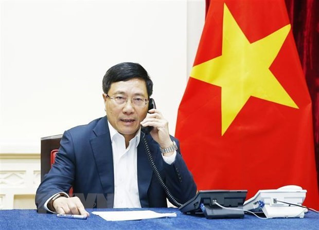 Le vice-PM et ministre des AE en conversation téléphonique avec le ministre malaisien des AE ảnh 1 Le vice-PM et ministre des AE en conversation téléphonique avec le ministre malaisien des AE ảnh 1