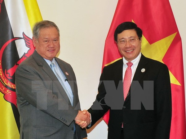 Pham Binh Minh rencontre le deuxième ministre des AE et du Commerce du Brunei ảnh 1 Pham Binh Minh rencontre le deuxième ministre des AE et du Commerce du Brunei ảnh 1