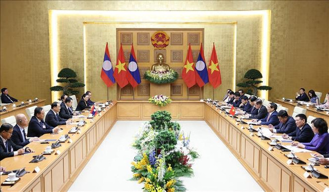 Rencontre des Premiers ministres du Vietnam et du Laos ảnh 2 Rencontre des Premiers ministres du Vietnam et du Laos ảnh 2