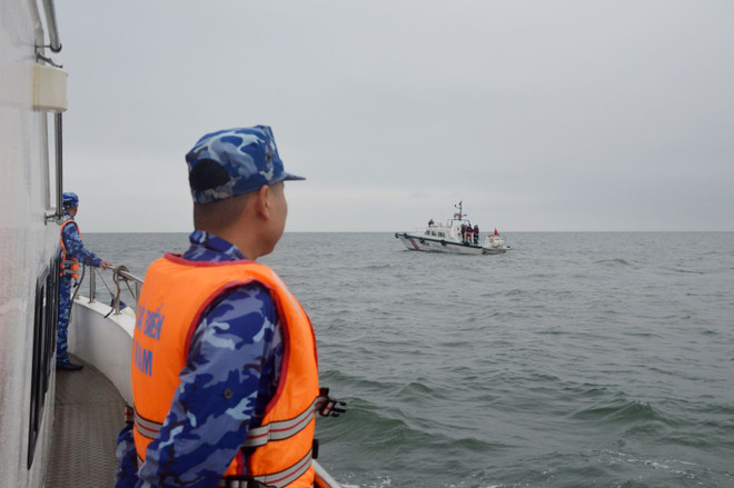 Les garde-côtes vietnamiens et chinois effectuent une patrouille conjointe ảnh 1 Les garde-côtes vietnamiens et chinois effectuent une patrouille conjointe ảnh 1