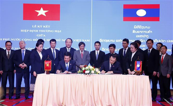 Signature d’un nouvel accord commercial Vietnam-Laos ảnh 1 Signature d’un nouvel accord commercial Vietnam-Laos ảnh 1