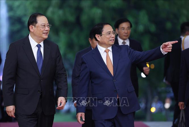 Rencontre des Premiers ministres du Vietnam et du Laos ảnh 1 Rencontre des Premiers ministres du Vietnam et du Laos ảnh 1