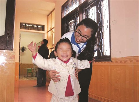Des jeunes volontaires en blouse blanche à Vinh ảnh 2 Des jeunes volontaires en blouse blanche à Vinh ảnh 2