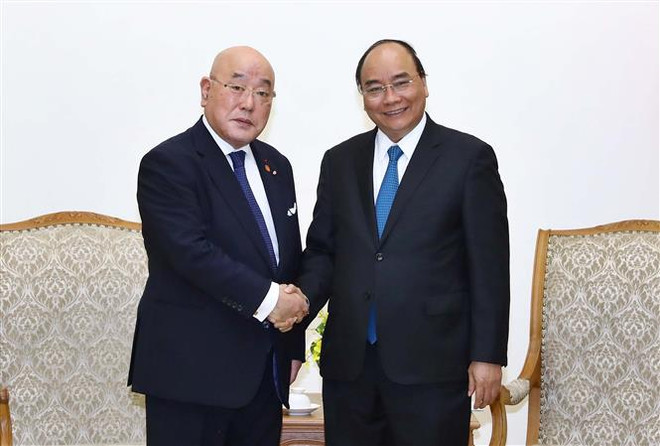 Le PM reçoit le conseiller spécial du cabinet du PM japonais ảnh 1 Le PM reçoit le conseiller spécial du cabinet du PM japonais ảnh 1