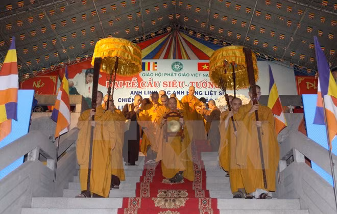 Bouddhisme : promotion de la coopération Vietnam-Laos ảnh 1