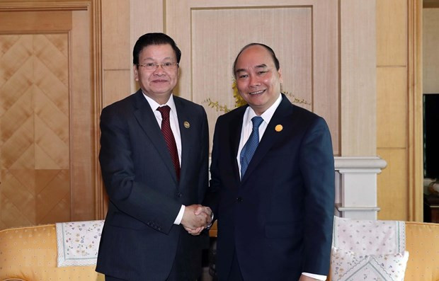 Le PM lao au Vietnam pour renforcer les liens spéciaux ảnh 1 Le PM lao au Vietnam pour renforcer les liens spéciaux ảnh 1