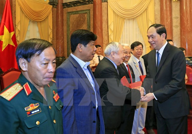 Rencontre du président Tran Dai Quang avec des soldats volontaires vietnamiens au Cambodge ảnh 1 Rencontre du président Tran Dai Quang avec des soldats volontaires vietnamiens au Cambodge ảnh 1