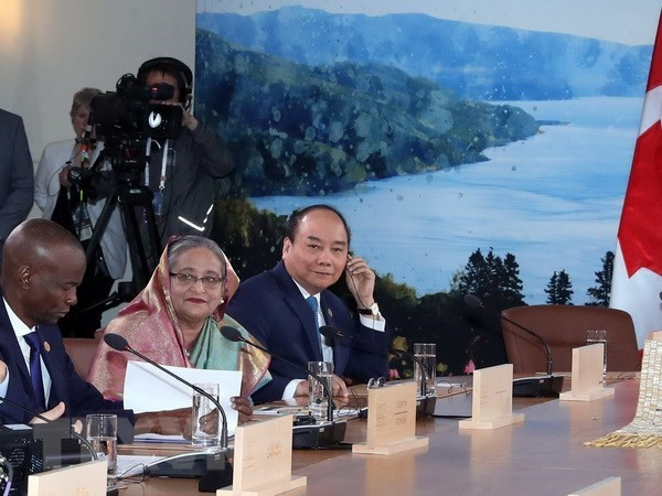 Un article de VNA sur la participation du Vietnam au Sommet du G7 élargi a publié au Canada ảnh 1 Un article de VNA sur la participation du Vietnam au Sommet du G7 élargi a publié au Canada ảnh 1