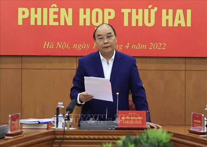 Le président Nguyen Xuan Phuc préside une réunion sur l’édification de l’Etat de droit socialiste ảnh 1