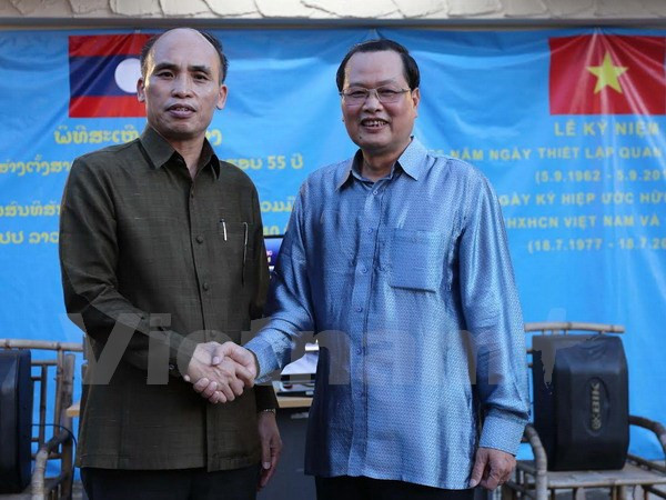 Echange d'amitié Vietnam-Laos à Singapour ảnh 1 Echange d'amitié Vietnam-Laos à Singapour ảnh 1