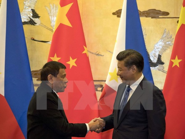 Chine-Philippines: conversation téléphonique sur les relations bilatérales ảnh 1 Chine-Philippines: conversation téléphonique sur les relations bilatérales ảnh 1