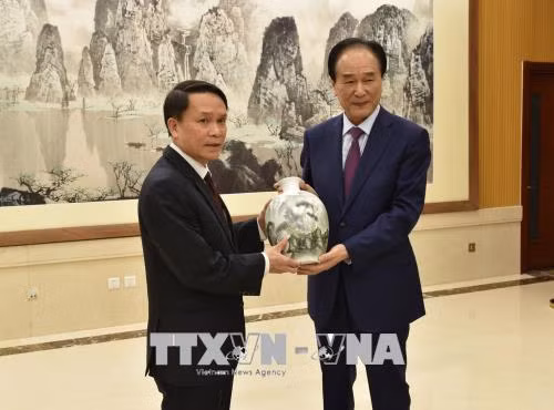 Approfondir les relations de coopération entre la VNA et Xinhua ảnh 1