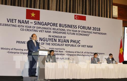 Le PM invite à intensifier les liens économiques Vietnam-Singapour ảnh 2 Le PM invite à intensifier les liens économiques Vietnam-Singapour ảnh 2