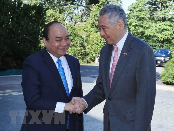 Cérémonie d’accueil réservée au PM Nguyên Xuân Phuc en visite officielle à Singapour ảnh 1 Cérémonie d’accueil réservée au PM Nguyên Xuân Phuc en visite officielle à Singapour ảnh 1