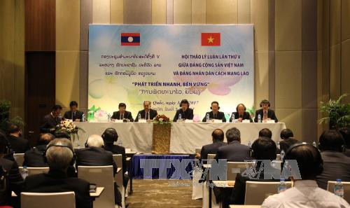 Clôture du colloque théorique entre le PCV et le Parti populaire révolutionnaire du Laos ảnh 1 Clôture du colloque théorique entre le PCV et le Parti populaire révolutionnaire du Laos ảnh 1