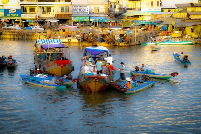 Plongée dans les marchés flottants du delta du Mékong ảnh 3 Plongée dans les marchés flottants du delta du Mékong ảnh 3