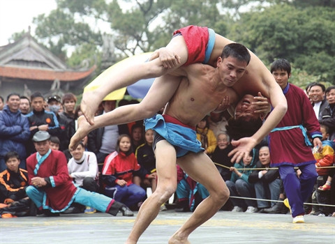 La lutte, toujours aussi populaire à Hanoi ảnh 1 La lutte, toujours aussi populaire à Hanoi ảnh 1