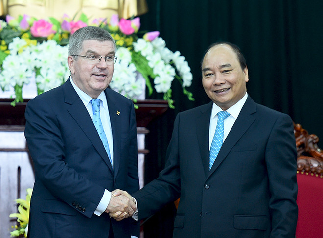 Le Premier ministre Nguyên Xuân Phuc reçoit les présidents du CIO et du COA ảnh 1 Le Premier ministre Nguyên Xuân Phuc reçoit les présidents du CIO et du COA ảnh 1