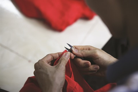 Le village de couture des tuniques de Trach Xa, l’empire du mâle ảnh 5