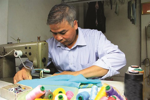 Le village de couture des tuniques de Trach Xa, l’empire du mâle ảnh 3