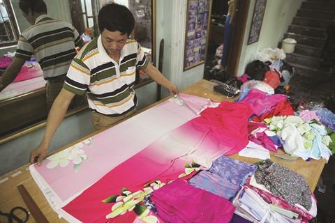 Le village de couture des tuniques de Trach Xa, l’empire du mâle ảnh 2