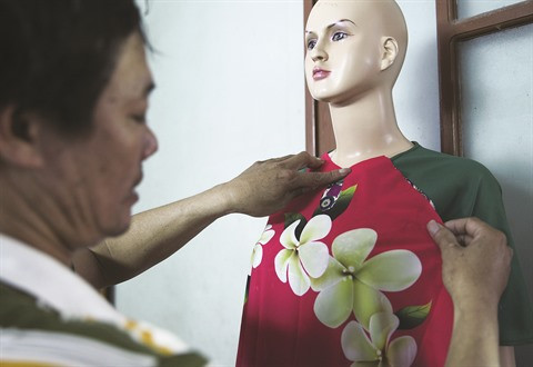 Le village de couture des tuniques de Trach Xa, l’empire du mâle ảnh 4