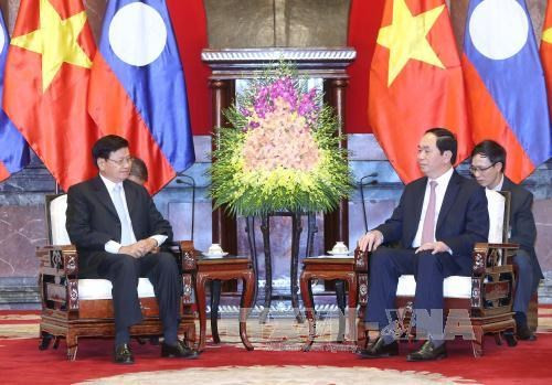 Le président Tran Dai Quang reçoit le PM laotien Thongloun Sisoulith ảnh 1 Le président Tran Dai Quang reçoit le PM laotien Thongloun Sisoulith ảnh 1