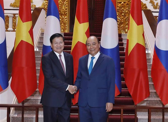 Entretien entre les Premiers ministres vietnamien et laotien ảnh 1