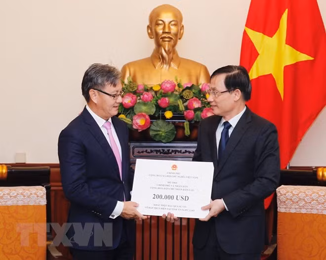 Effondrement de barrage: aider le peuple laotien à régler les conséquences ảnh 1