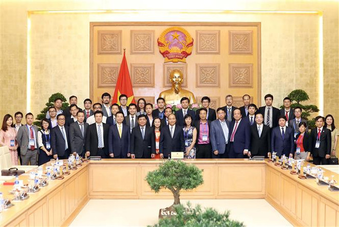 Le PM engage les Viêt kiêu à participer au développement scientifique et technologique au Vietnam ảnh 3 Le PM engage les Viêt kiêu à participer au développement scientifique et technologique au Vietnam ảnh 3