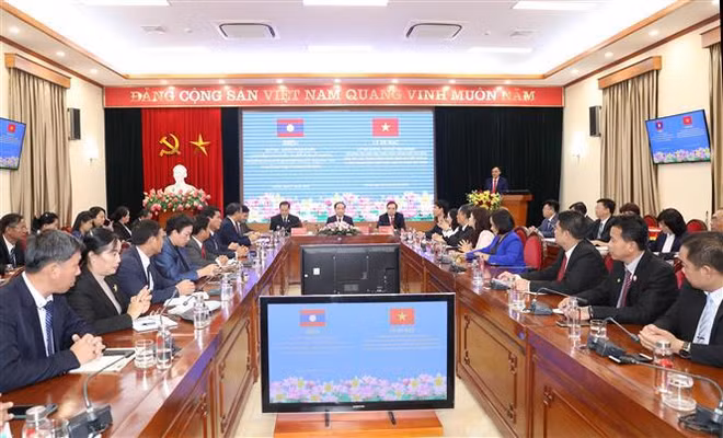Vietnam et Laos partagent d'expériences liées à la mobilisation des masses ảnh 2
