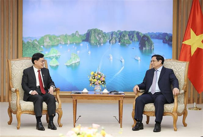 Le PM Pham Minh Chinh reçoit le vice-PM singapourien Heng Swee Keat ảnh 1 Le PM Pham Minh Chinh reçoit le vice-PM singapourien Heng Swee Keat ảnh 1