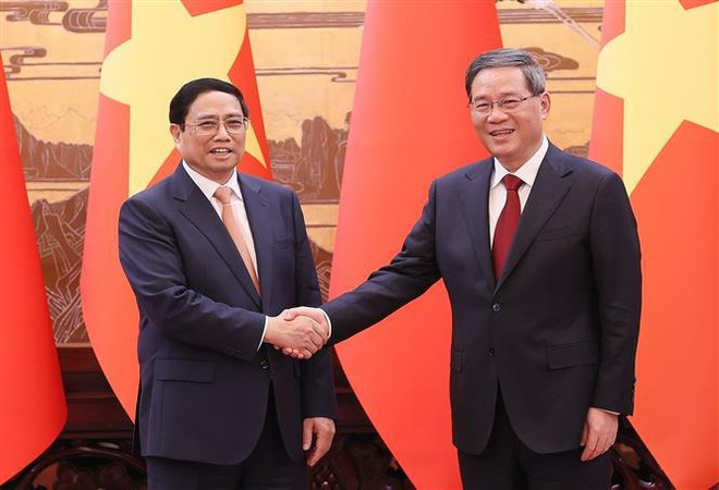 Le PM chinois préside la cérémonie d'accueil du PM vietnamien ảnh 2 Le PM chinois préside la cérémonie d'accueil du PM vietnamien ảnh 2